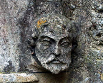 Head on the west side of the chancel north door October 2009